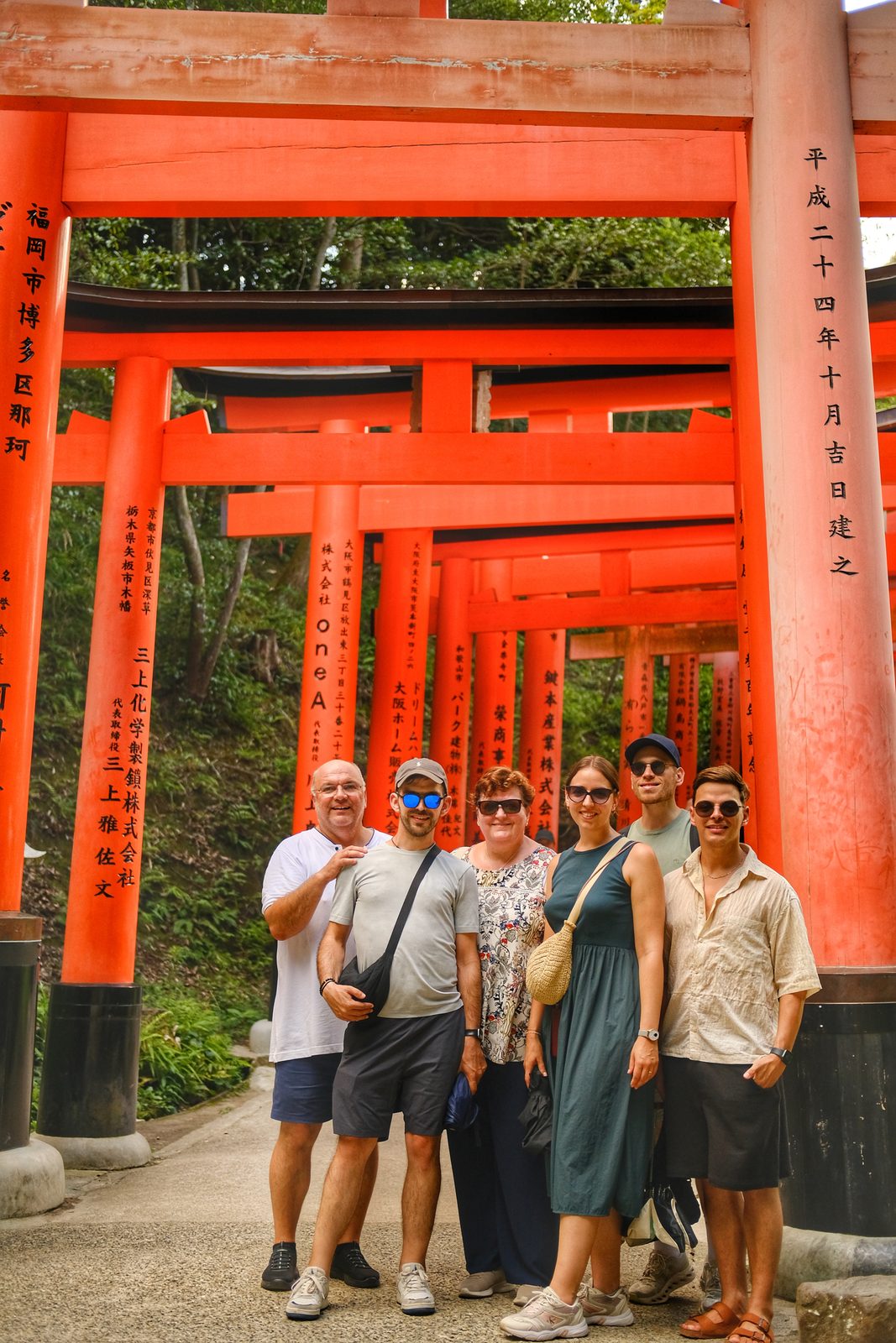 Guests together at the red shrine gates